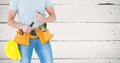 Composite image of Carpenter with hammer against white wood panel Royalty Free Stock Photo