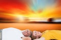 Composite image of casual couple lying on floor Royalty Free Stock Photo