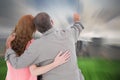 Composite image of casual couple pointing and looking Royalty Free Stock Photo