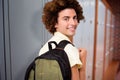 Composite image of casual young man in office corridor Royalty Free Stock Photo