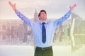 Composite image of cheering businessman with his arms raised up Royalty Free Stock Photo