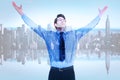 Composite image of cheering businessman with his arms raised up Royalty Free Stock Photo