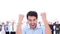 Composite image of cheering man looking at camera Royalty Free Stock Photo