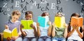 Composite image of children reading books at park Royalty Free Stock Photo