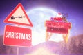 Composite image of christmas road sign Royalty Free Stock Photo