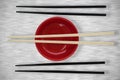 Composite image of close up of chopstick arranged by bowl Royalty Free Stock Photo