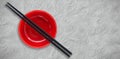 Composite image of close up of chopstick and bowl Royalty Free Stock Photo