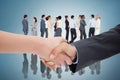 Composite image of close up of a handshake Royalty Free Stock Photo