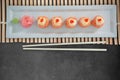 Composite image of close up of japanese food arranged in row on plate Royalty Free Stock Photo