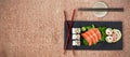 Composite image of close up of japanese food with chopsticks Royalty Free Stock Photo
