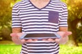 Composite image of close up of man holding tablet Royalty Free Stock Photo