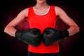 Composite image of close-up mid section of a determined female boxer