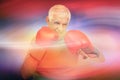 Composite image of close-up portrait of a determined senior boxer Royalty Free Stock Photo