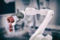 Composite image of close up of robotic arm with red question mark 3d Royalty Free Stock Photo