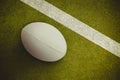 Composite image of close-up of rugby ball Royalty Free Stock Photo