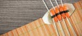 Composite image of close up of salmon sushi with chopsticks in plate Royalty Free Stock Photo