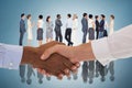 Composite image of close-up shot of a handshake Royalty Free Stock Photo