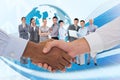 Composite image of close-up shot of a handshake in office Royalty Free Stock Photo