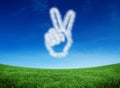 Composite image of cloud in shape of hand making peace sign Royalty Free Stock Photo