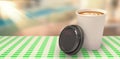 Composite image of coffee cup in front of its cover Royalty Free Stock Photo