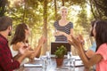 Composite image of colleagues clapping hands in a meeting