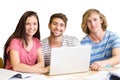 Composite image of college students using laptop in library Royalty Free Stock Photo