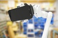 Composite image of composite image of robot holding mobile phone 3d Royalty Free Stock Photo