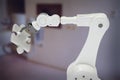 Composite image of composite image of robotic arm holding jigsaw piece 3d Royalty Free Stock Photo