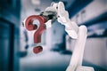 Composite image of composite image of robotic arm holding question mark 3d Royalty Free Stock Photo