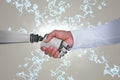 Composite image of computer graphic image of businessman and robot shaking hands