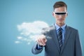 Composite image of confident businessman pointing finger while using virtual reality glasses 3d Royalty Free Stock Photo