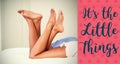 Composite image of couple legs on bed and valentines words Royalty Free Stock Photo