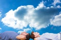 Composite image of couple lying on the floor Royalty Free Stock Photo