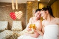 Composite image of couple relaxing in the thermal suite Royalty Free Stock Photo