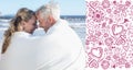 Composite image of couple sitting on the beach under blanket smiling at each other Royalty Free Stock Photo