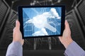 Composite image of cropped hand of man holding digital tablet Royalty Free Stock Photo