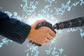 Composite image of cropped hands of robot and businessman dealing Royalty Free Stock Photo