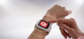 Composite image of cropped image of hands using smart watch Royalty Free Stock Photo