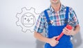Composite image of cropped image of plumber holding monkey wrench Royalty Free Stock Photo