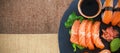 Composite image of cropped image of sushi served in plate Royalty Free Stock Photo