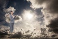 Composite image of curious young businesswoman posing with binoculars Royalty Free Stock Photo