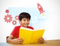 Composite image of cute boy reading book in library Royalty Free Stock Photo