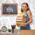 Composite image of cute little girl carrying books in library Royalty Free Stock Photo