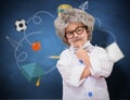 Composite image of cute pupil in lab coat Royalty Free Stock Photo
