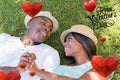 Composite image of cute valentines couple Royalty Free Stock Photo