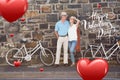 Composite image of cute valentines couple Royalty Free Stock Photo