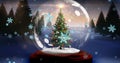 Composite image of decorated christmas tree in snow globe with snowflakes at sunset Royalty Free Stock Photo