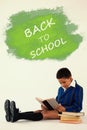 Composite image of digital composite image of back to school text on blue spray paint Royalty Free Stock Photo