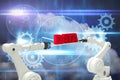 Composite image of digitally composite image of robotic hands holding red data text Royalty Free Stock Photo