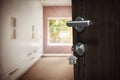 Composite image of digitally generated image of brown door with house key Royalty Free Stock Photo